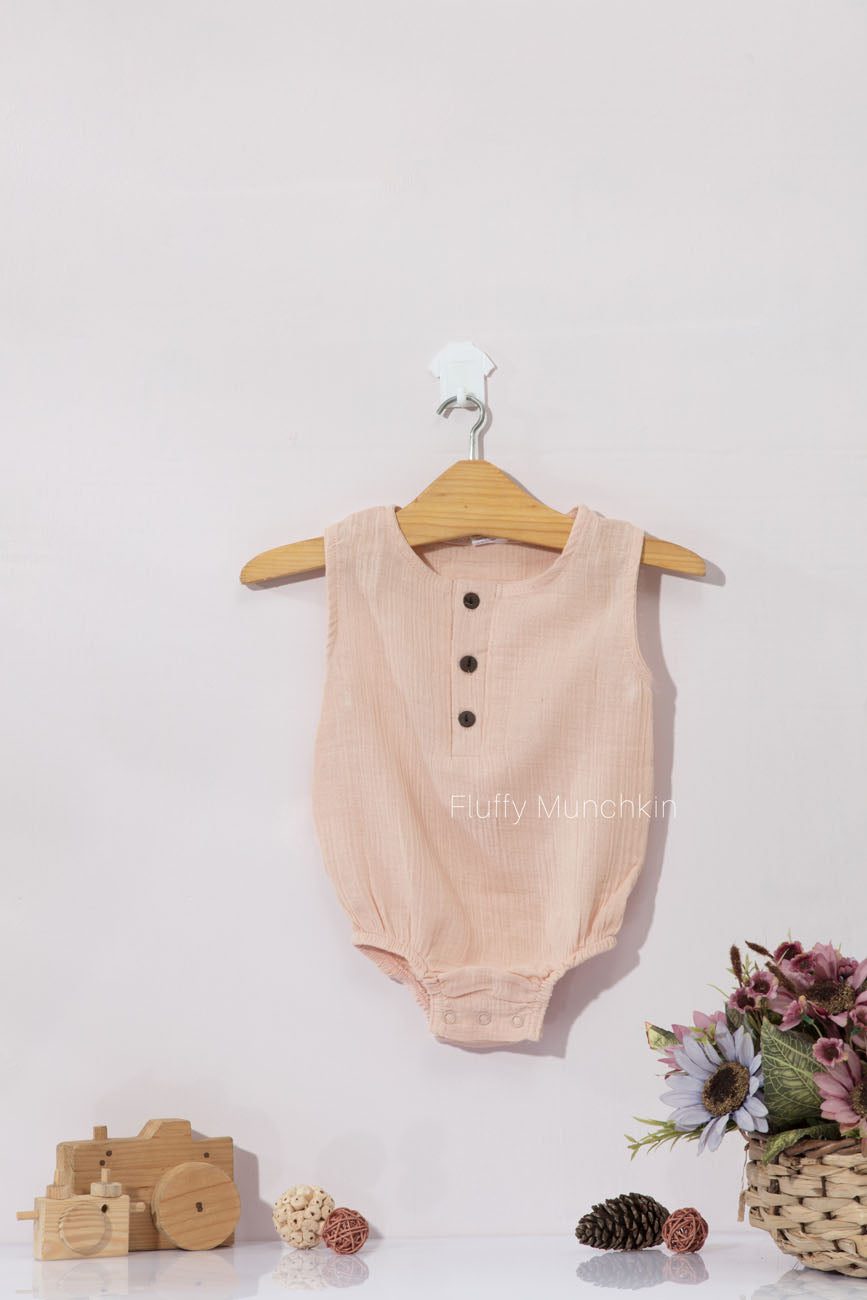 SLEEVELESS ONESIE - PASTEL PEACH